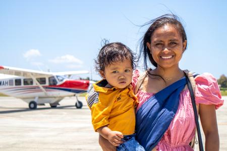A woman and small boy with a plane