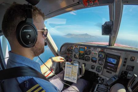 A pilot in the cockpit