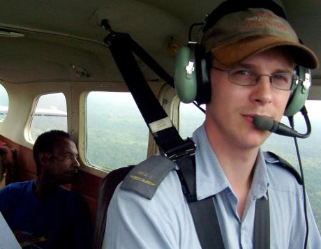MAF Pilot in plane with Papua New Guinean passenger