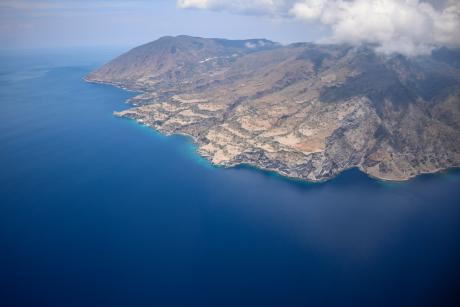 An island and deep water channel surrounding it